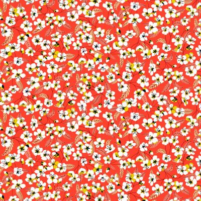 Tissu Coton imprimé Miyu sur fond Corail - Par 10 cm