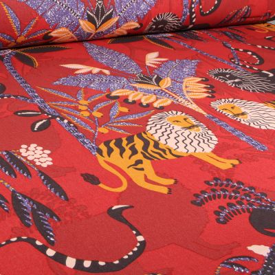 Tissu Toile de Coton Simba sur fond Terre de Sienne - Par 10 cm
