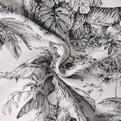 Tissu Jacquard Daktari inspiration toile de Jouy scène tropicale noir sur fond Blanc - Par 10 cm