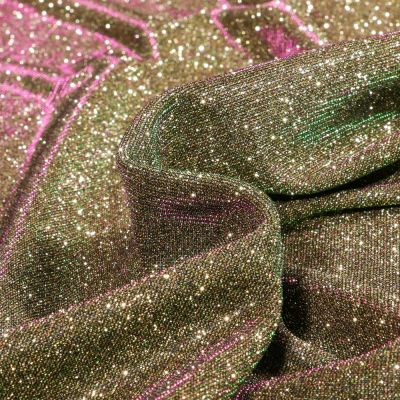 Tissu Jersey Lurex Pailleté sur fond Or reflets verts et mauves - Par 10 cm