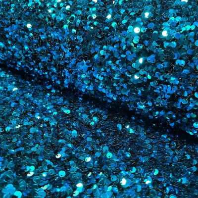 Tissu Sequins épais extensible Bleu turquoise - Par 10 cm