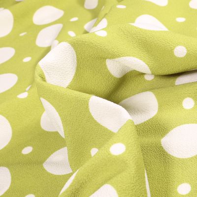 Tissu Crêpe Bubble sur fond Vert anis - Par 10 cm