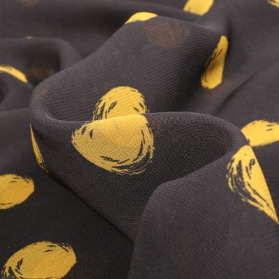 Tissu Mousseline Pois 3 cm jaune sur fond Noir - Par 10 cm