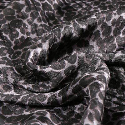 Tissu Mousseline Cheetah sur fond Gris - Par 10 cm