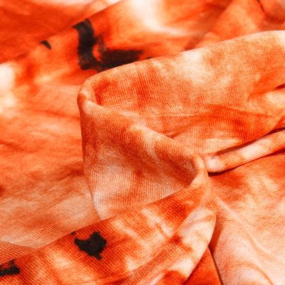 Tissu Jersey Viscose  Tye and dye Dorina sur fond Orange - Par 10 cm