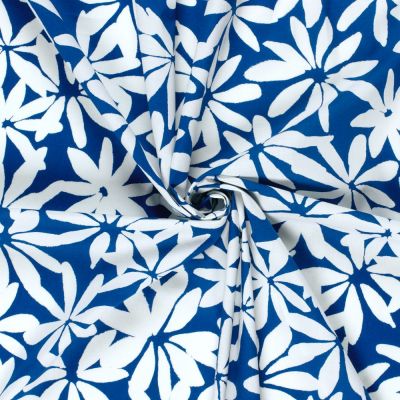Tissu Coton stretch imprimé Fleurs blanches sur fond Bleu cobalt - Par 10 cm