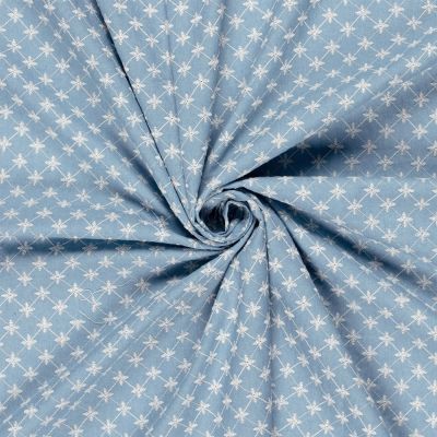 Tissu Chambray Coton Fleurs brodées sur fond Bleu clair - Par 10 cm