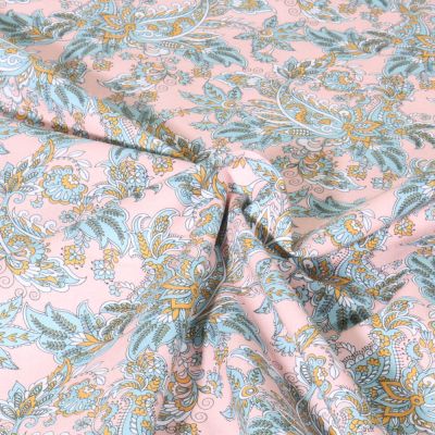 Tissu Popeline de Coton Paisley bleu ciel sur fond Rose clair - Par 10 cm