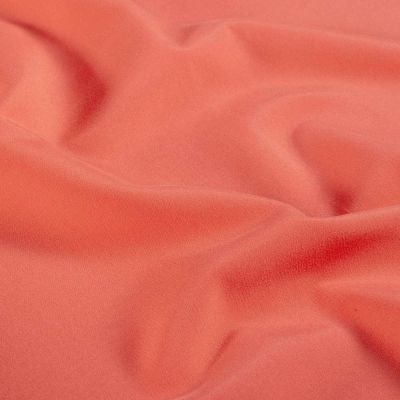 Tissu Short de bain déperlant recyclé Solina sur fond Corail - Par 10 cm