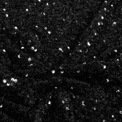 Tissu Sequins Cosmos sequins Argentés sur fond Noir - Par 10 cm