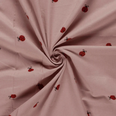 Tissu Flanelle de Coton Léonie coccinelles Rouges sur fond Rose poudré - Par 10 cm
