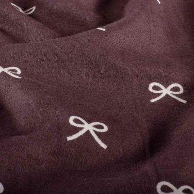 Tissu Flanelle de Coton Almée nœuds Blancs sur fond Prune - Par 10 cm