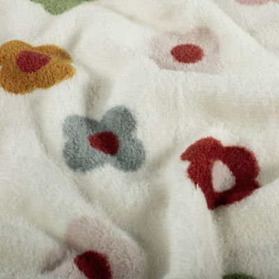 Tissu Fausse fourrure Maya envers doudou fleurs Multicolores sur fond Blanc cassé - Par 10 cm