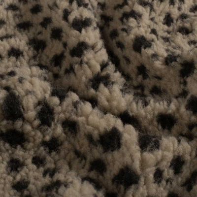 Tissu Fausse fourrure Mouton Calie léopard Noir sur fond Beige - Par 10 cm