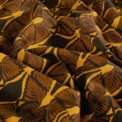 Tissu Sweat léger French Terry Véra extensible feuilles Marron chaud sur fond Moutarde - Par 10 cm