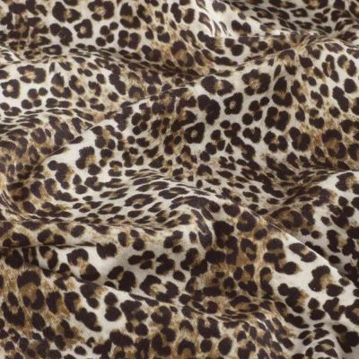 Tissu Sweat léger French Terry Alya extensible léopard Brun et Noir sur fond Beige sable - Par 10 cm