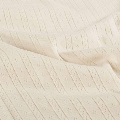 Tissu Jersey Coton ajouré Camille uni Ivoire - Par 10 cm