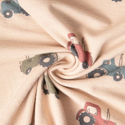 Tissu Maille Jersey Coton Tom tracteurs sur fond Beige - Par 10 cm