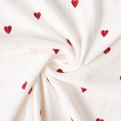 Tissu Jersey 100% Coton ajouré Baby petits coeurs sur fond Ecru - Par 10 cm