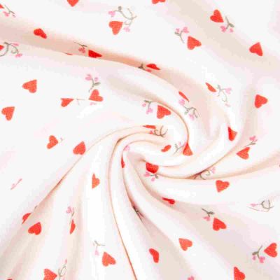 Tissu Eponge Monoface Coeurs Ilove sur fond Ecru - Par 10 cm