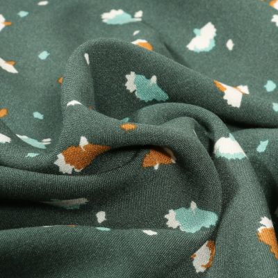 Tissu Viscose Arty Paepae sur fond Vert foncé - Par 10 cm