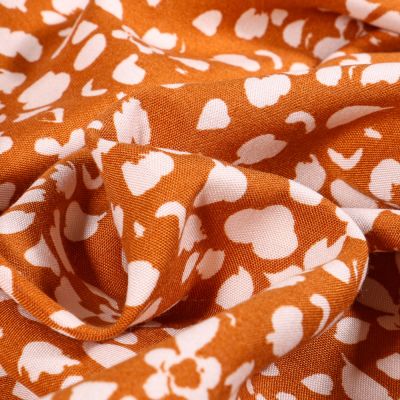 Tissu Viscose Arty Rello sur fond Ocre - Par 10 cm