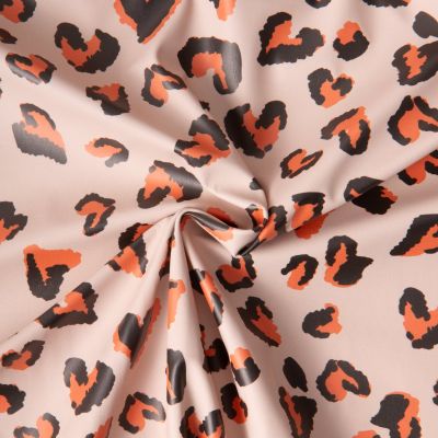 Tissu Imperméable déperlant Saian coeurs Orange sur fond Beige - Par 10 cm