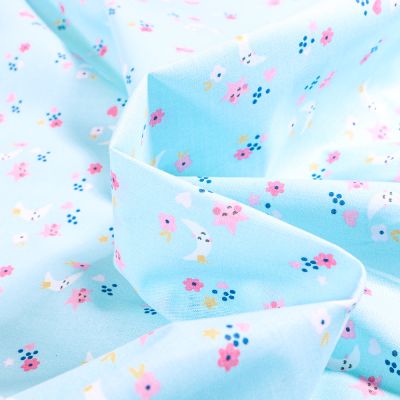 Tissu Coton imprimé Arty Mini étoiles et lune sur fond Bleu ciel - Par 10 cm
