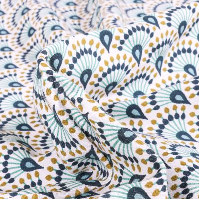 Tissu Viscose Arty Zadani sur fond Bleu - Par 10 cm