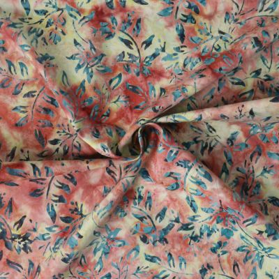 Tissu Coton imprimé Batik Solflame sur fond Jaune pastel - Par 10 cm
