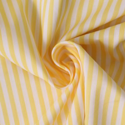 Tissu Coton imprimé  rayé Lisalou sur fond Jaune pastel - Par 10 cm