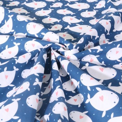 Tissu Coton imprimé Baleines d’amour sur fond Bleu - Par 10 cm