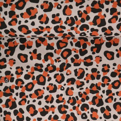 Tissu Toile de Coton aspect lin Léopard orange et noir sur fond Naturel - Par 10 cm