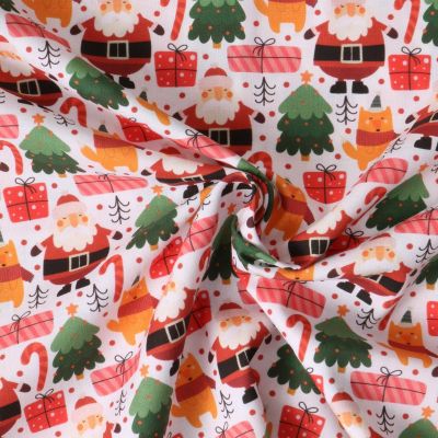 Tissu Coton imprimé  Néola pères Noël Rouges sur fond Blanc - Par 10 cm