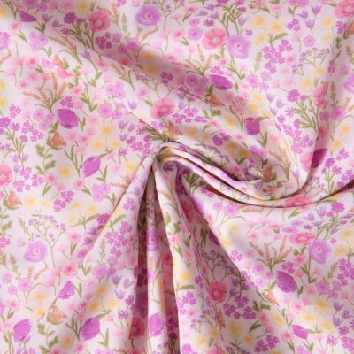 Tissu Popeline de Coton légère imprimé Jardin fleuri rose et lilas sur fond Rose clair - Par 10 cm