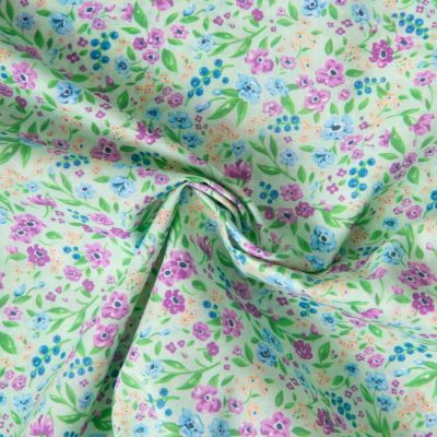 Tissu Voile de Coton digital imprimé Jardin en Fleurs sur fond Vert amande - Par 10 cm