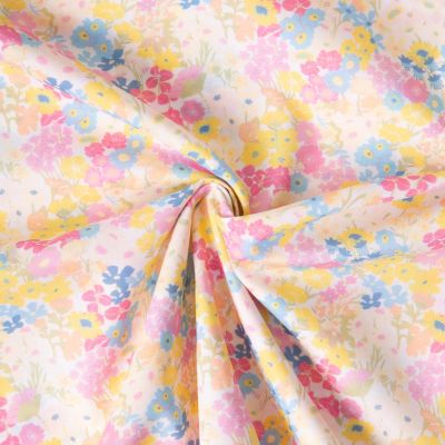 Tissu Popeline de Coton légère Petites fleurs bleues, jaunes et roses sur fond Blanc - Par 10 cm