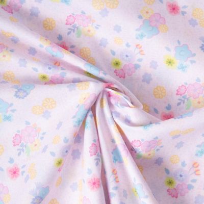 Tissu Popeline de Coton légère Petites fleurs roses, jaunes et bleues sur fond Lilas - Par 10 cm