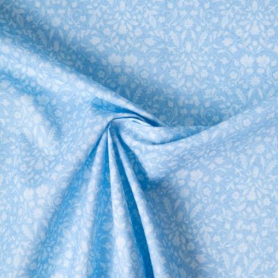 Tissu Popeline de Coton légère Floral romantique blanc sur fond Bleu clair - Par 10 cm