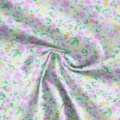 Tissu Voile de Coton digital imprimé Brise floral sur fond Vert d&#039;eau - Par 10 cm