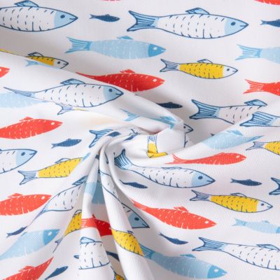 Tissu Coton Sergé d&#039;ameublement Sardinades rouge jaune bleu sur fond Blanc - Par 10 cm