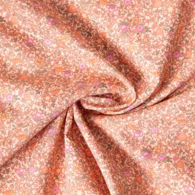 Tissu Batiste de Coton imprimé Fleuris sur fond Saumon - Par 10 cm