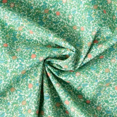 Tissu Batiste de Coton Charlie tapis fleuri sur fond Vert - Par 10 cm