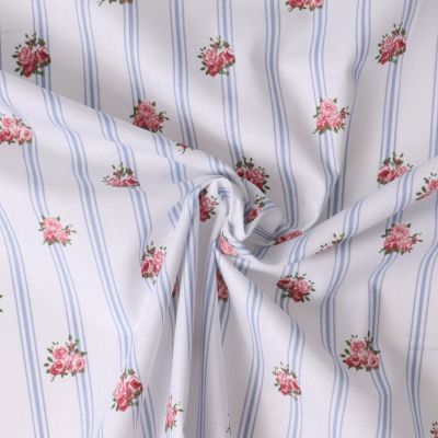 Tissu Popeline de Coton Eglantine rayures Bleues et fleurs Roses sur fond Blanc - Par 10 cm