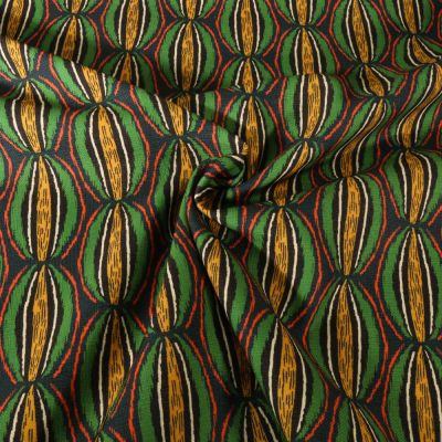 Tissu Toile aspect Canvas déperlant Big Manioc sur fond Vert - Par 10 cm