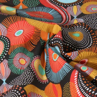 Tissu Coton imprimé Boubou Terra sur fond Noir - Par 10 cm