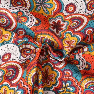 Tissu Popeline de Coton  Eugénie mandala floral Bleu sur fond Corail - Par 10 cm