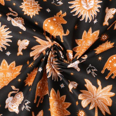 Tissu Popeline de Coton  Cassiopée motif cosmique Ocre intense sur fond Noir profond - Par 10 cm