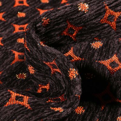 Tissu Jacquard relief velours Emir sur fond Orange - Par 10 cm