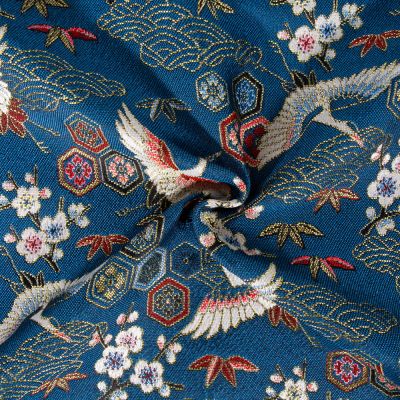 Tissu Jacquard d&#039;ameublement tissé teint Grues sur fond Bleu - Par 10 cm